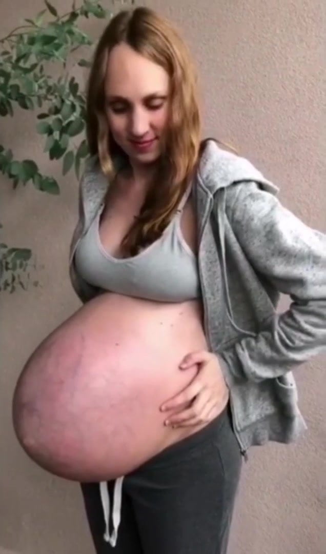 Girls pregnant belly expands webcam