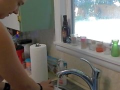 Short darling washes dishes nude
